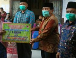 Bupati Sukiman Salurkan Bantuan Bagi Korban Puting Beliung di Bangun Purba