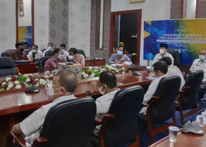 Optimalisasi Pungutan Pajak Pusat dan Daerah, Bupati Sukiman Teken PKS