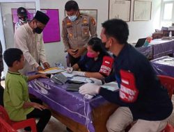 Sempena Hari Santri, Polres Inhu Gelar Vaksinasi dan Bakti Sosial di Pesantren Kahar Rahman