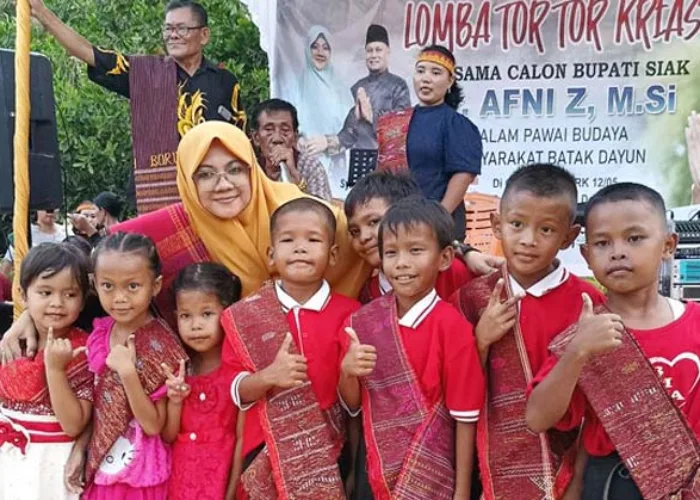 Ketika Afni-Syamsurizal Buat Etnis Batak di Dayun Siak Bahagia Lewat Lomba Tor-tor