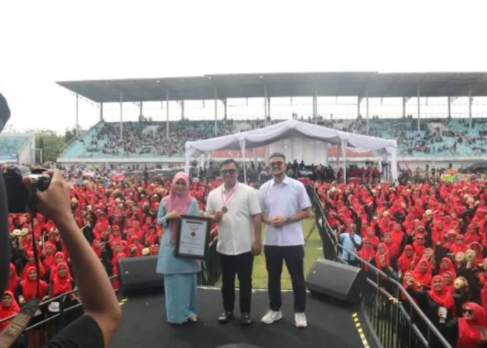 1.690 Perempuan di Dharmasraya Pecahkan Rekor MURI Lewat Gelaran Talempong Pacik